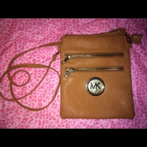 knock off michael kors crossbody|Michael Kors counterfeit purses.